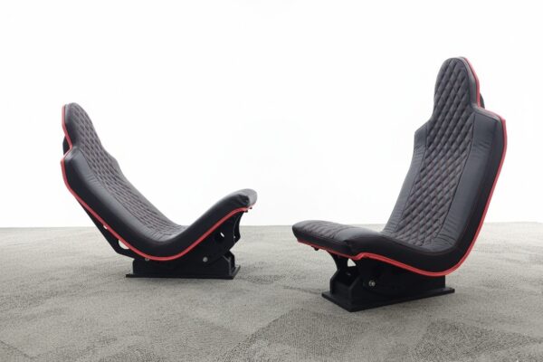 Simforge Apex sim racing seats in black premium Leather in F1 Seating Position (Left) and Truck Simulator Seating Position (Right)