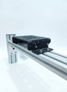 The Simforge Universal Wheelbase Mount with all included hardware, showcasing an easy and rigid upgrade for any 4080 aluminum profile sim rig.